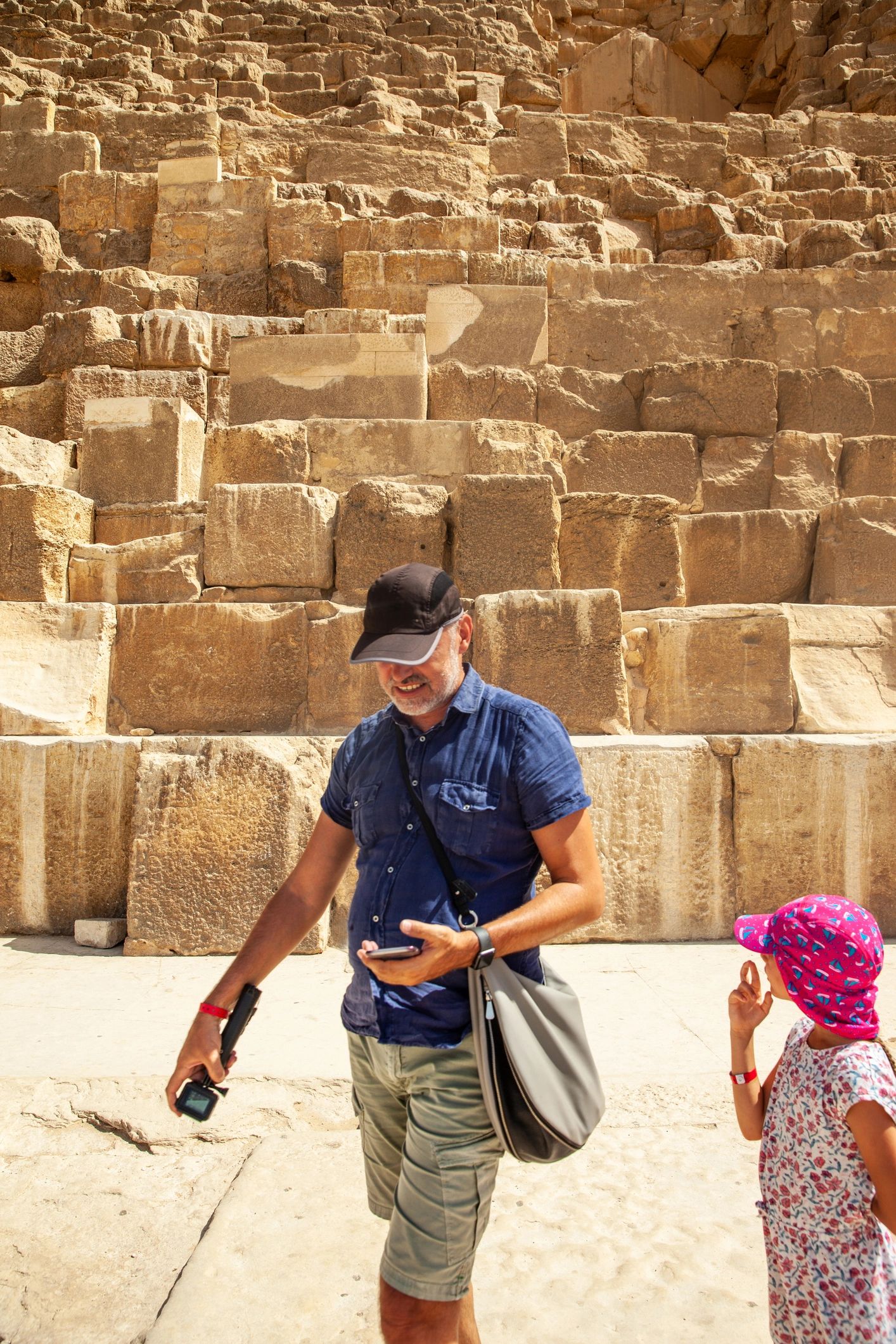 Father and daughter visiting the pyramids